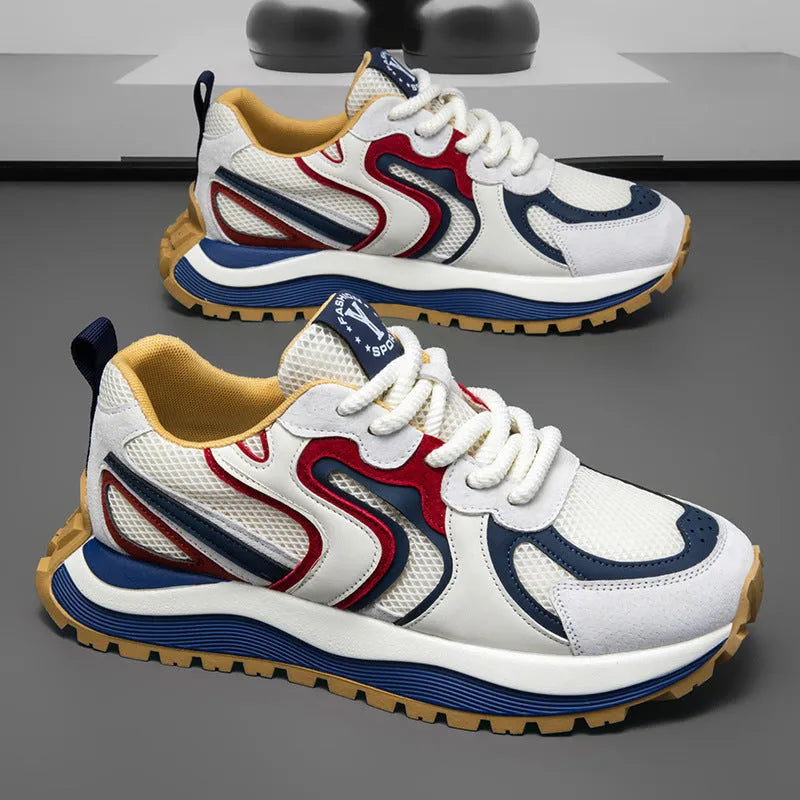 Men's yellow, black, and white mesh and synthetic leather casual sneakers with round toe and lace-up front.