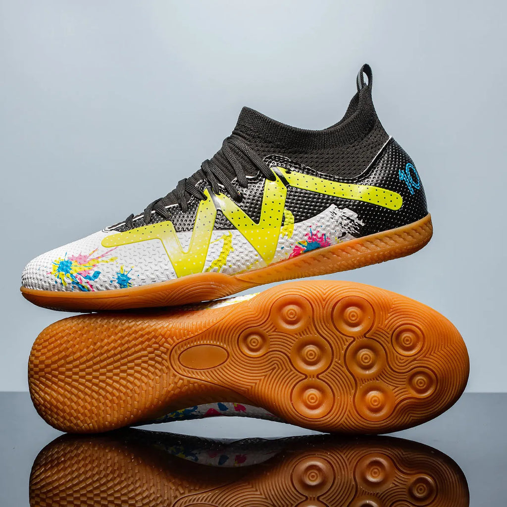 Low-top football boots with replaceable rubber studs on a non-slip sole, in Black and Yellow colourway.