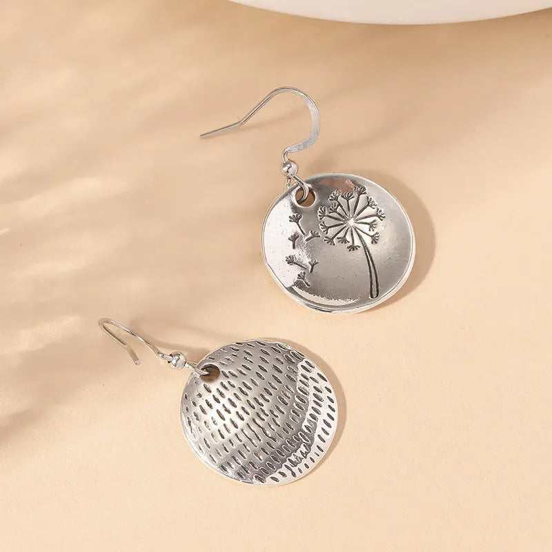 Round dandelion earrings in antique silver finish on zinc alloy for women