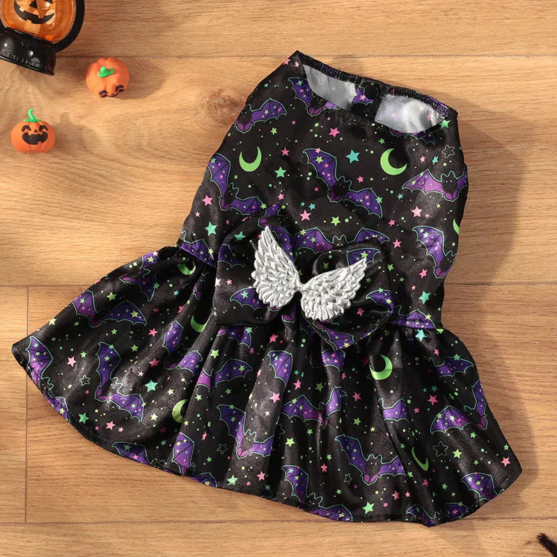 Halloween dog costume with angel wings design in bright pumpkin colour on a small dog.
