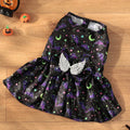 Halloween dog costume with angel wings design in bright pumpkin colour on a small dog.