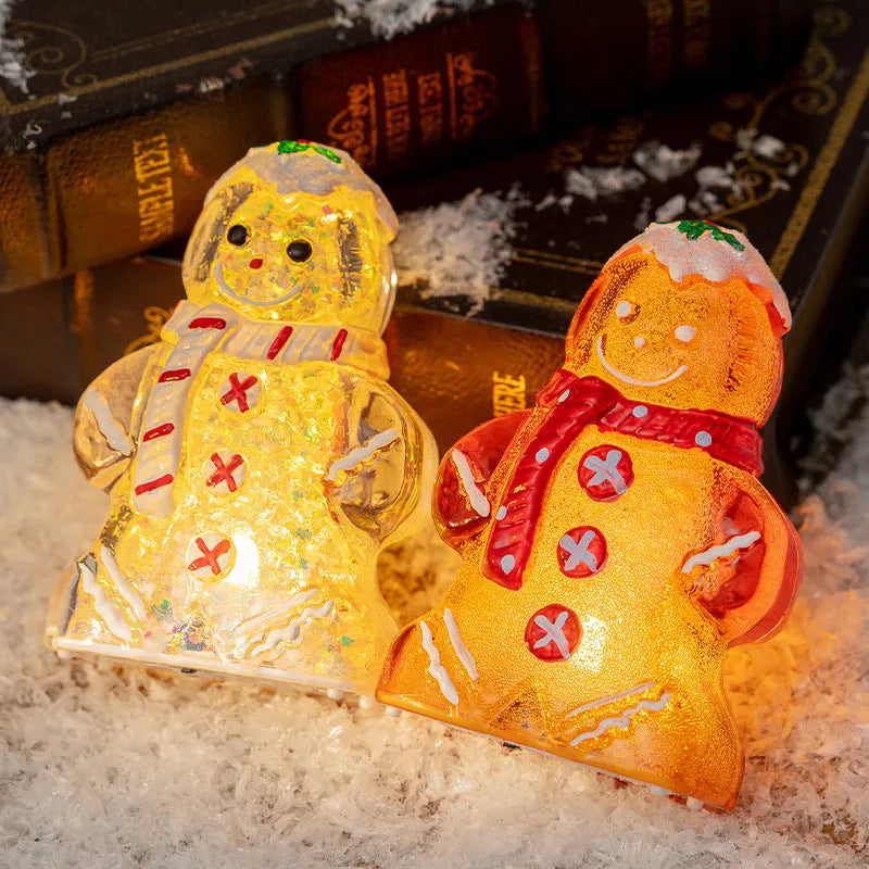 Glowing gingerbread man Christmas ornament with choice of scarf colours on Christmas tree branch