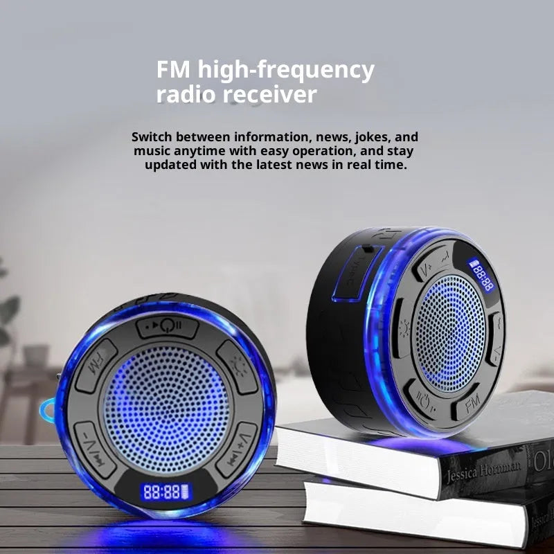 Mini waterproof Bluetooth speaker with suction cup in black for bathroom use
