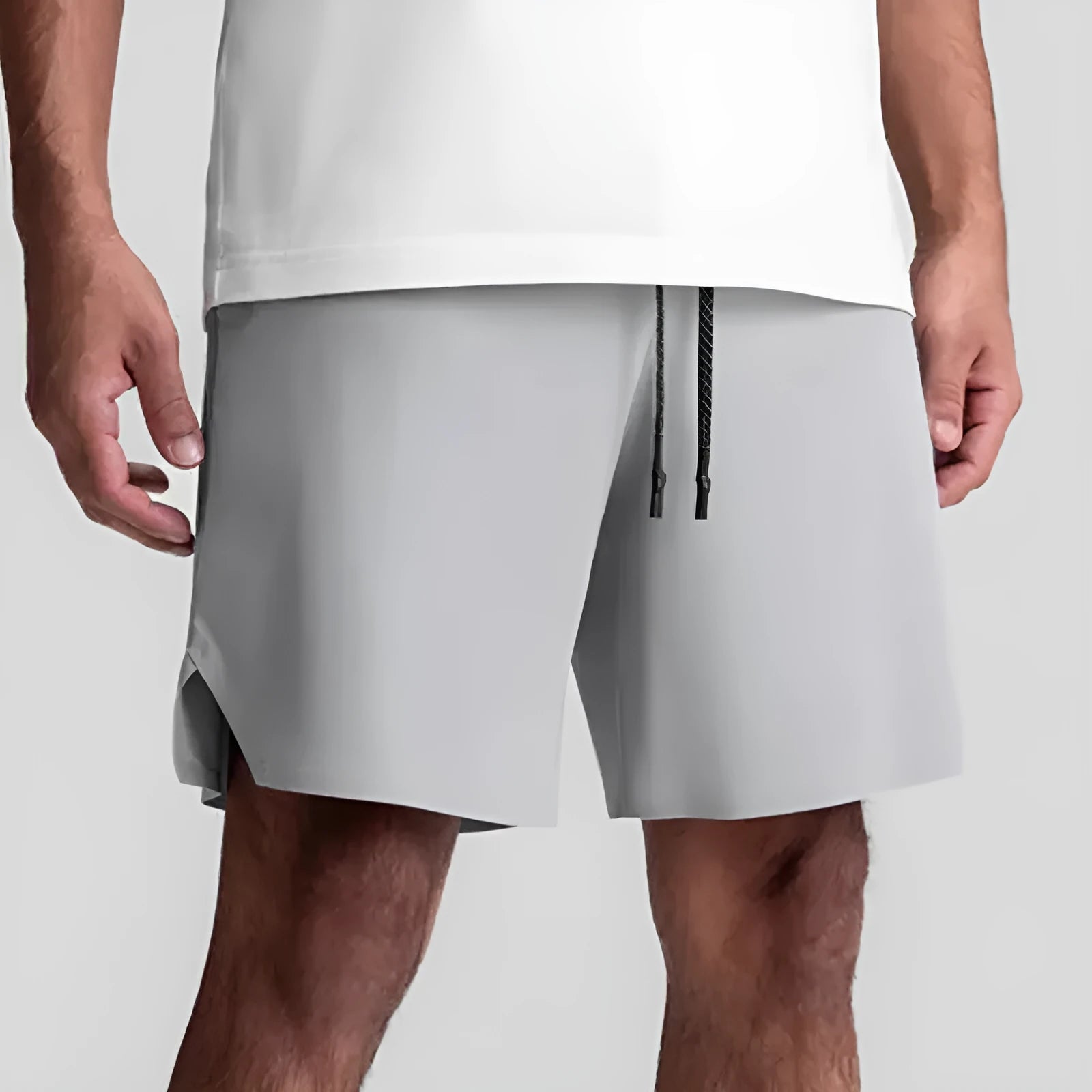 Men's grey seamless sports shorts with quick-drying fabric and straight knee-length cut