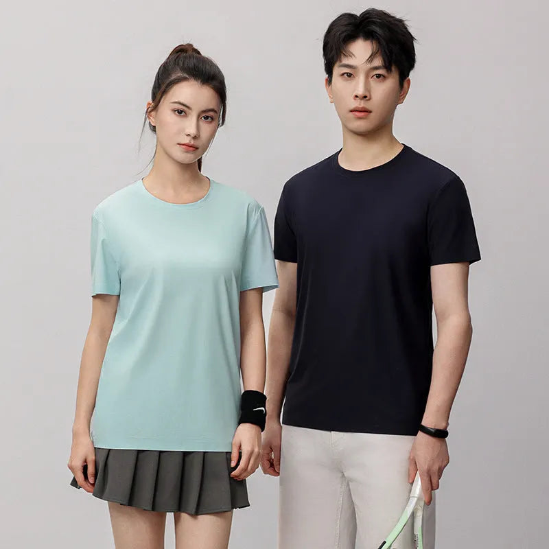 Man wearing a slim fit Ice Silk quick-dry T-shirt in apple green, showing short sleeves and casual style.