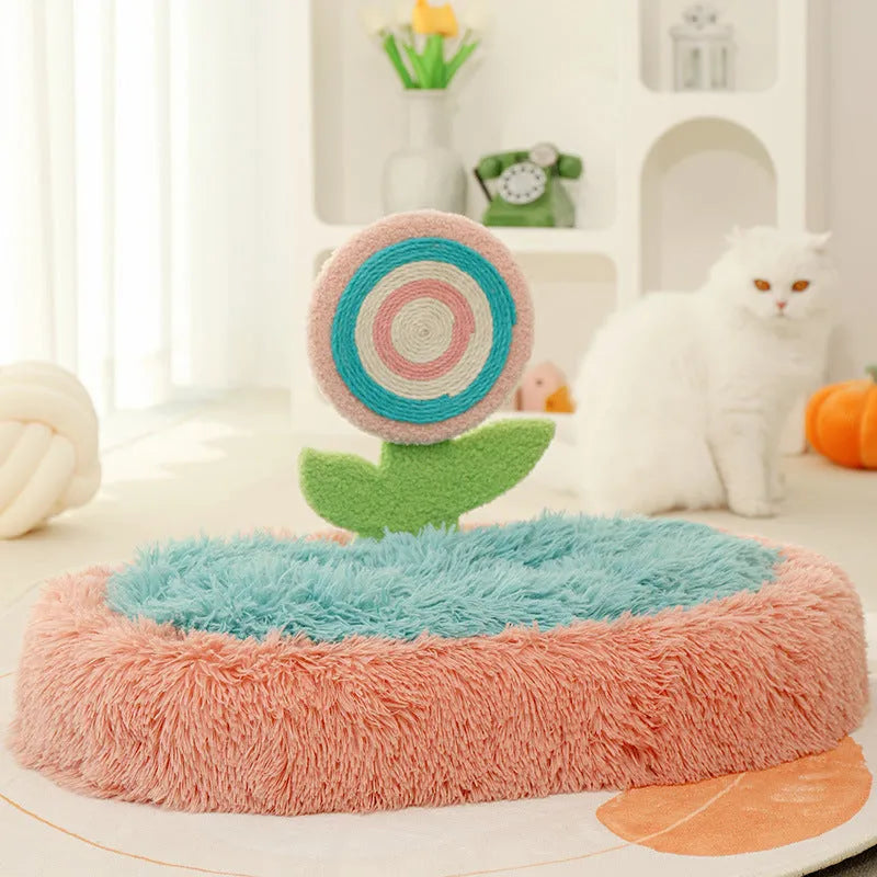 Pink elliptical plush cat nest bed with a soft padded base, shown disassembled.