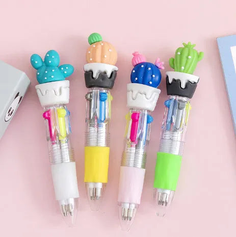 Cartoon press colour ballpoint pen with silicone grip showing four-colour mechanism and 0.7mm bullet tip