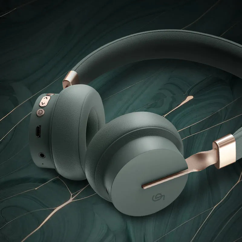 Headworn Bluetooth headset in solid colours: green, black, red, blue, or white.
