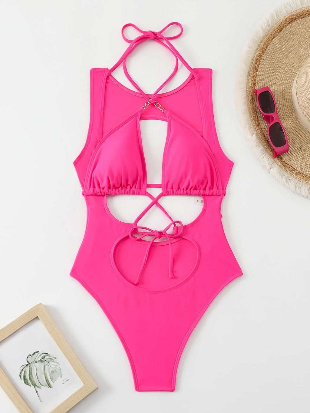 Bright pink one-piece swimsuit with cutout strap, nylon fabric and lining, sizes S M L for women