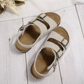 Women's cork beach sandals in beige with open toe and ankle buckle