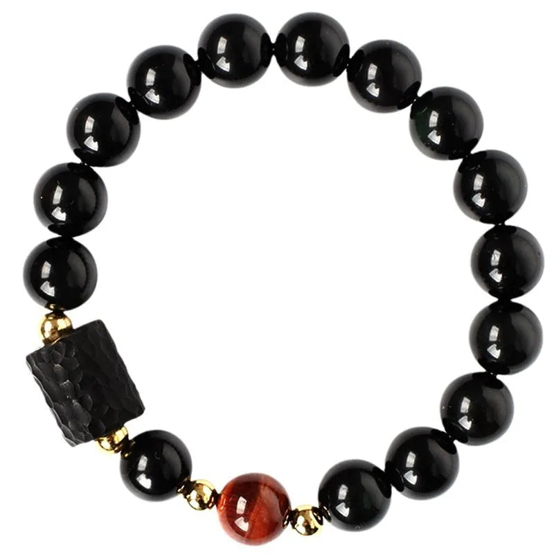 Handcrafted obsidian bracelet with 10mm yellow tiger eye beads on elastic cord