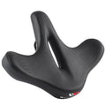 Black leather bicycle seat cushion with thick foam padding on a bike saddle.
