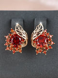 Round flowers feather design zircon earrings in champagne gold with coloured gemstone options.