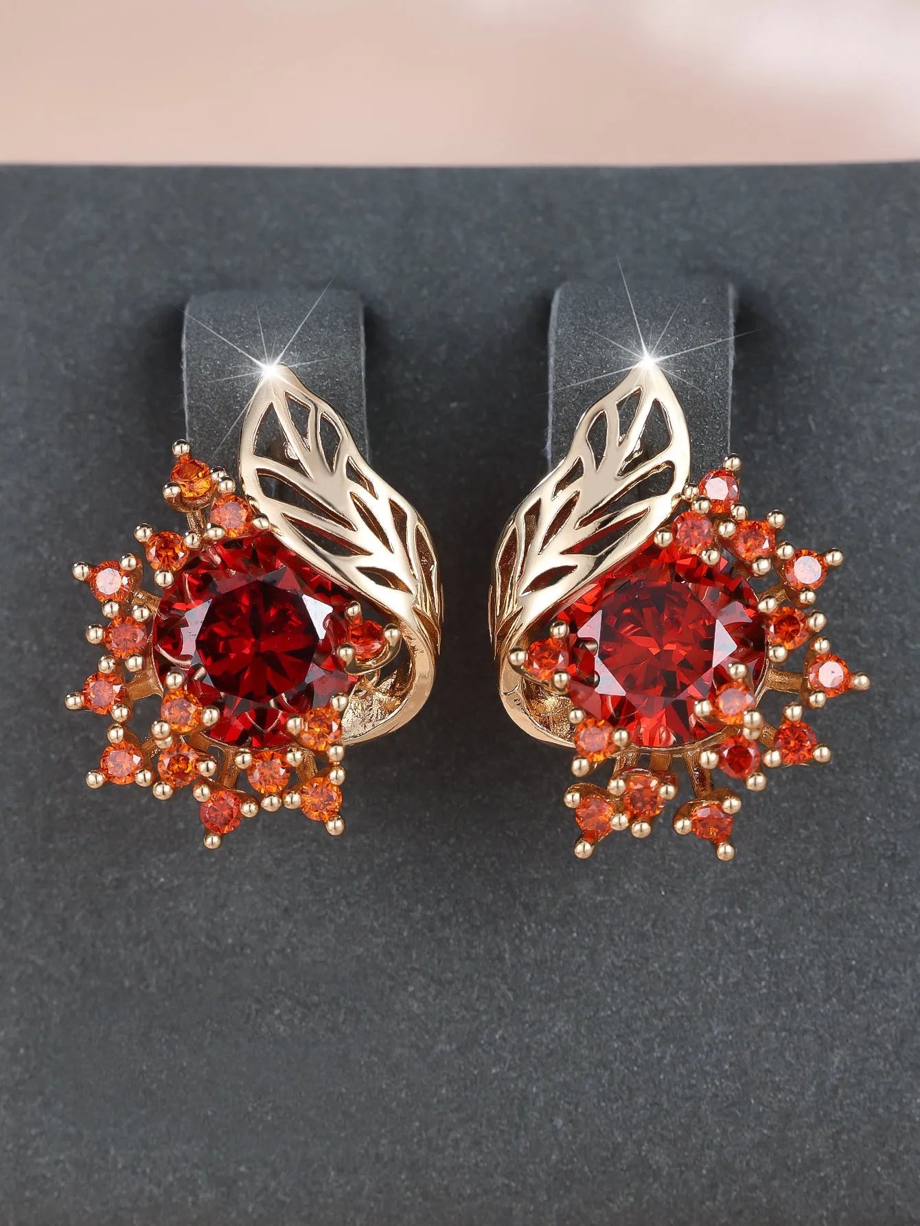 Round flowers feather design zircon earrings in champagne gold with coloured gemstone options.
