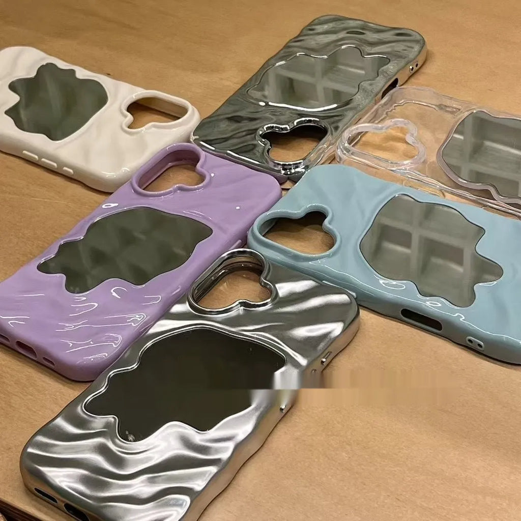 Solid colour phone case with a built-in mirror for iPhone models, shown in beige and purple.