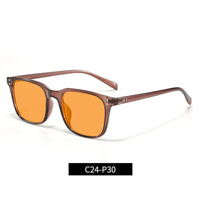 Orange tinted anti-blue light and UV protection glasses with a TR90 frame shown in one of the available colour options.