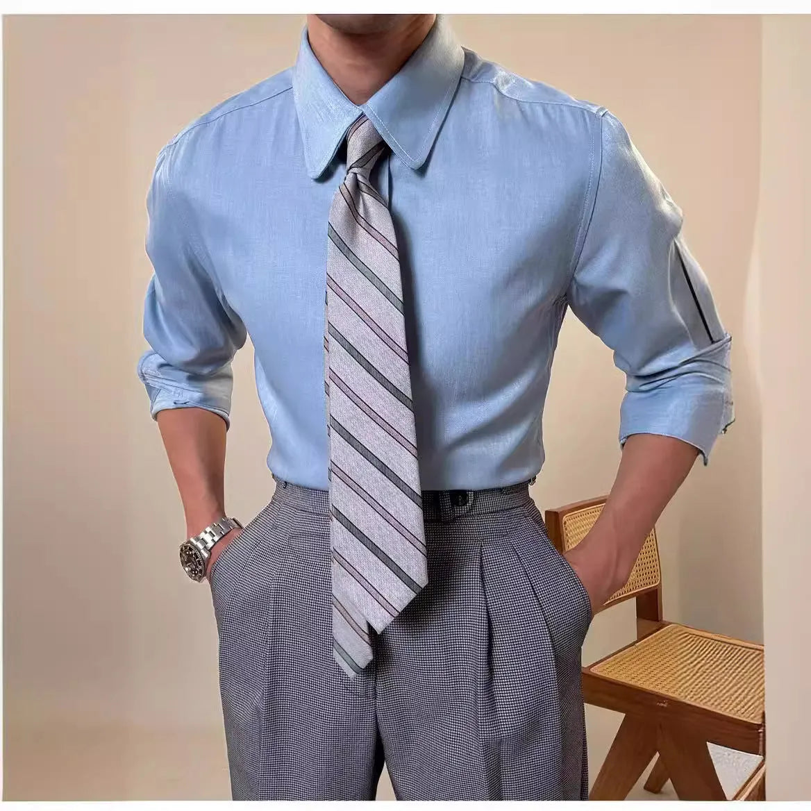 Men's blue round collar long sleeve shirt in slim fit design for casual and business wear