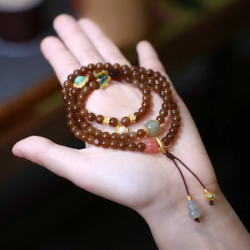 Brown jade Hetian three-ring bracelet with geometric design and silver-plated accessories