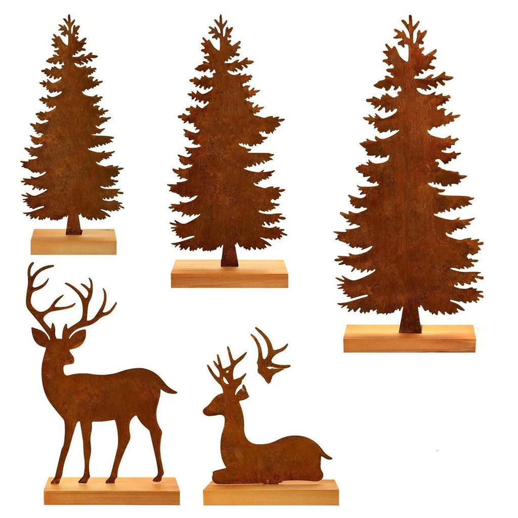 Set of three rusty metal Christmas ornaments featuring elk with antlers and trees, on a white background