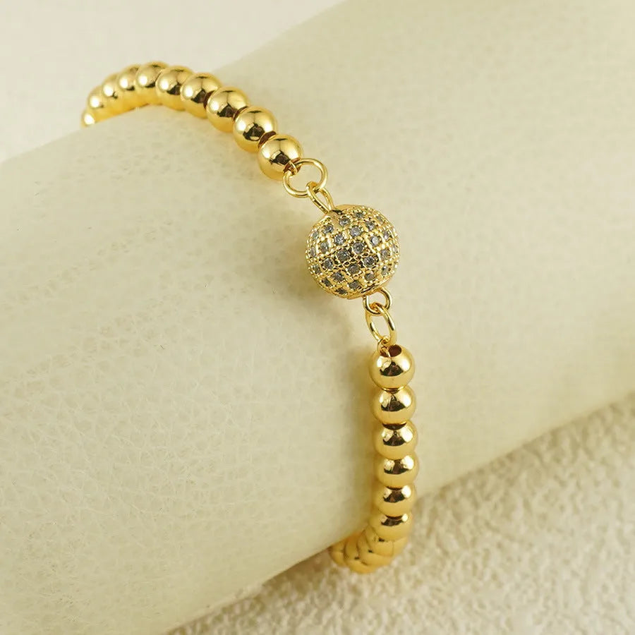 Arabic style heart-shaped copper bracelet for women with a round zircon stone centrepiece.