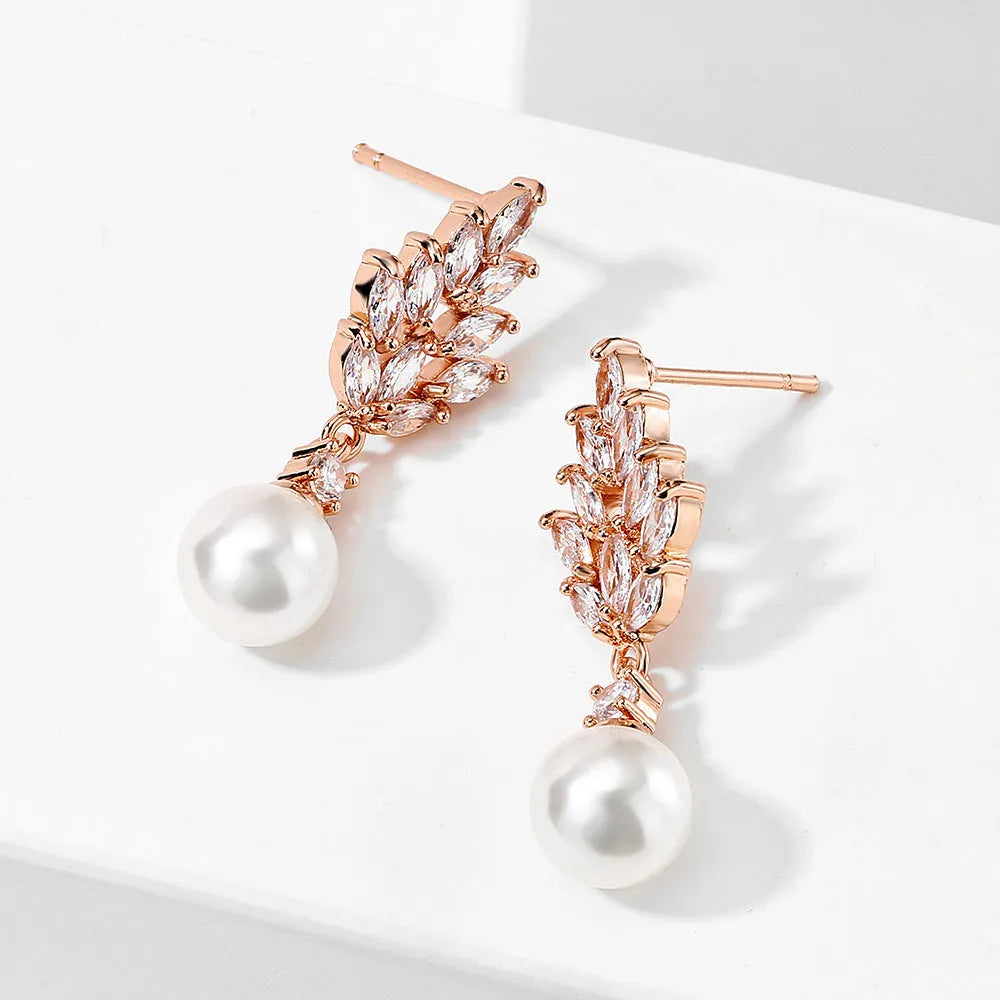 Geometric pearl earrings with micro inlaid zircon stones in gold plating