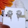 S925 sterling silver baroque flower earrings on a silver ring holder, showing gold and silver colour frame options.