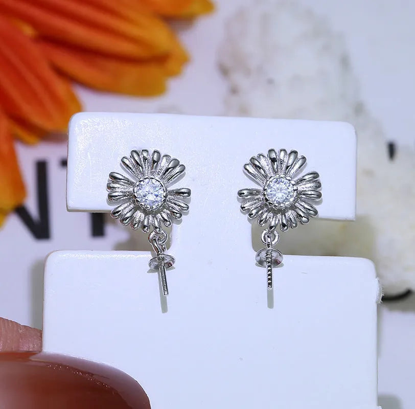 S925 sterling silver baroque flower earrings on a silver ring holder, showing gold and silver colour frame options.