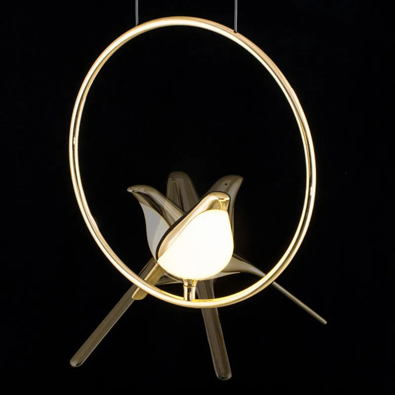 Modern minimalist magpie bird silhouette chandelier light fitting with a long drop.