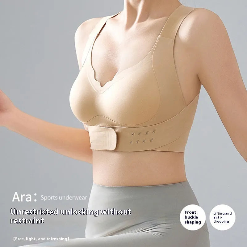 Women's sports bra with front buckle closure and back shaping design for yoga and exercise.