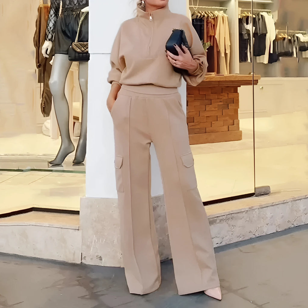 Women's light camel polyester two-piece work set with lapel top and wide-leg trousers on hanger