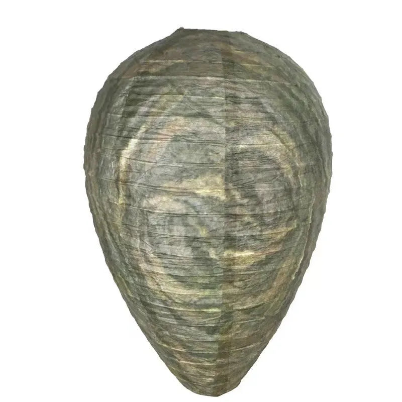 Oval flannel honeycomb lantern for wasp deterrence in a garden setting