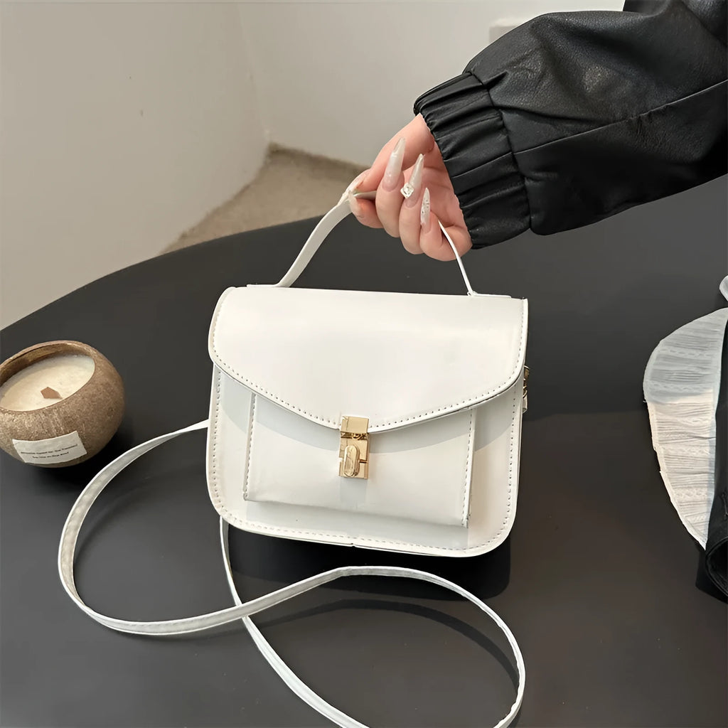 Retro-style horizontal square messenger bag in PU leather with crossbody strap and sandwich pocket