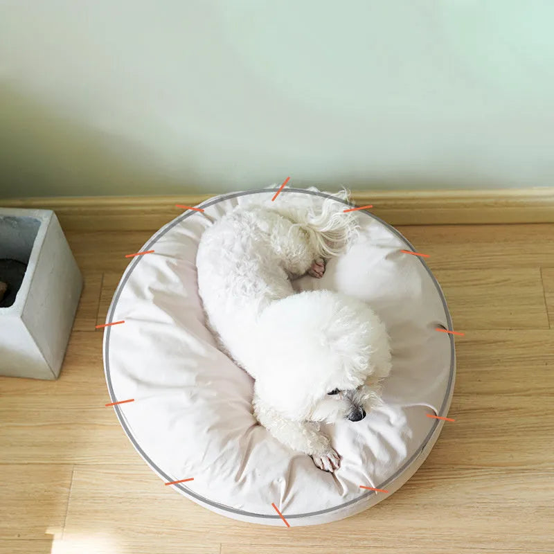 Round plush pet bed for small and medium dogs and cats, 60-80cm diameter, beige or grey, with raised rim.