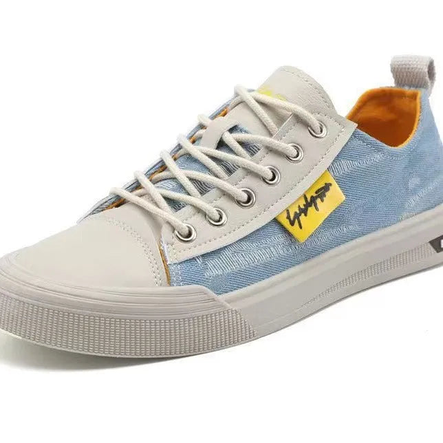 Men's canvas casual shoes in dark blue with front lace-up closure and rubber sole
