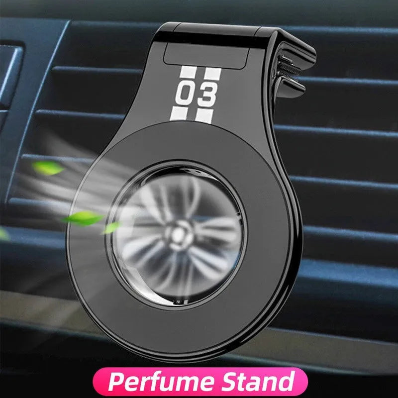 Magnetic car air vent phone holder with perfume diffuser in black, showing 360-degree rotation