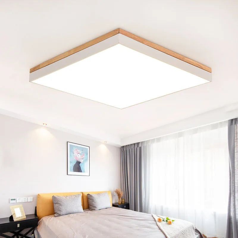 Round solid wood LED ceiling lamp with Nordic design in white finish showing dimmable light feature