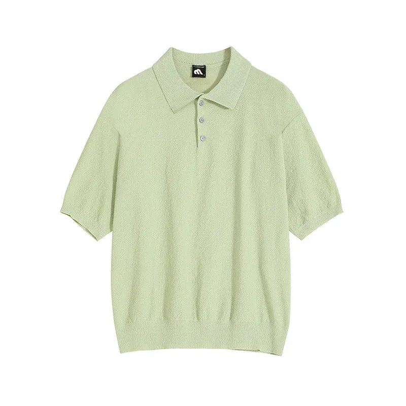 Men's caramel coloured retro knitted polo shirt with short sleeves and an asymmetrical design detail, laid flat.
