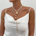 Long Y-shaped tassel pendant twin necklace in imitation pearl with gold electroplated finish on woman