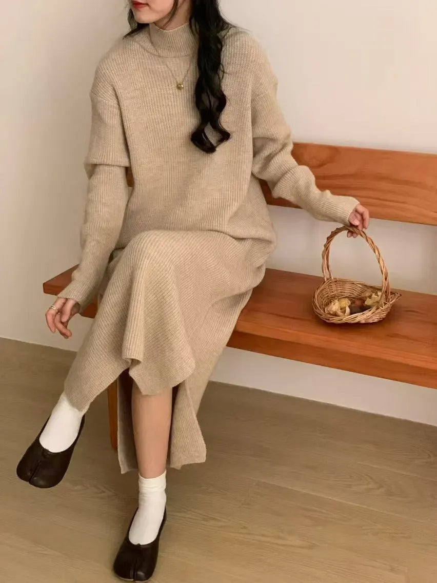 Acrylic knitted dress with half turtleneck, high waist, and midi length in solid colour