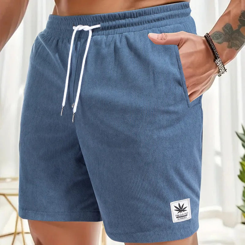 Man's drawstring waist summer shorts in blue, showing straight leg and casual fit