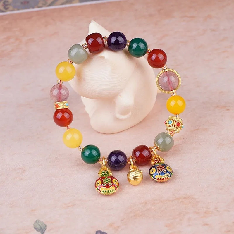 Swallowing Gold Beast agate bracelet with 10mm beads and hand-woven construction