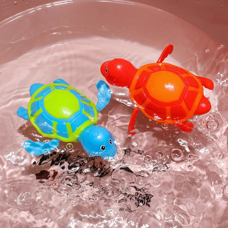 Plastic swimming turtle baby bath toy floating in water for aquatic play