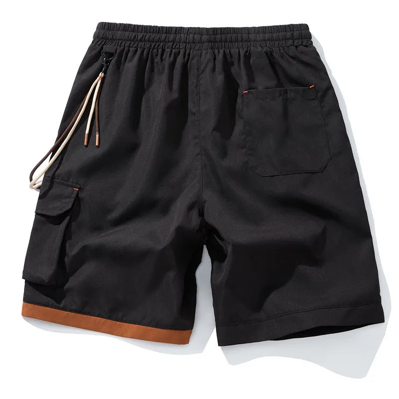 Man wearing coffee-coloured plus size bamboo fibre sports shorts with a high waist and straight leg.