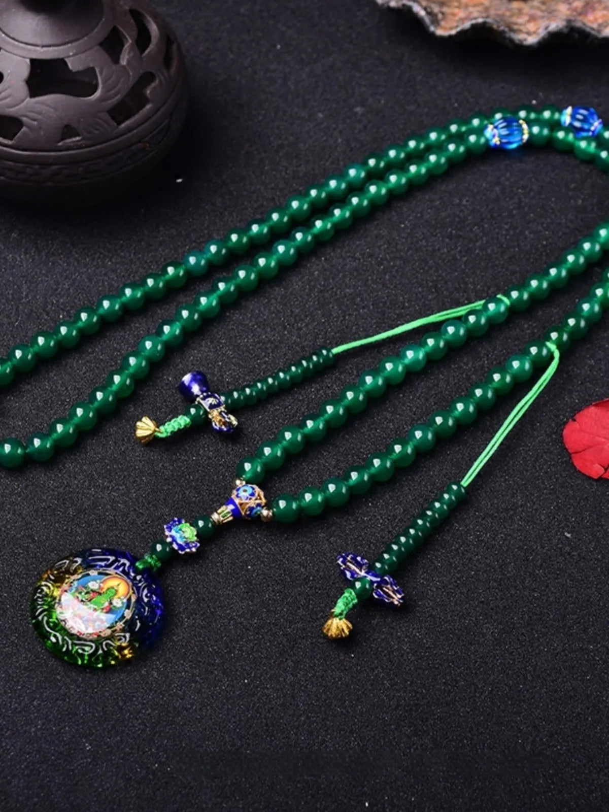 Natural green agate 108 bead bracelet with thangka pendant, worn as a multi-loop unisex accessory.
