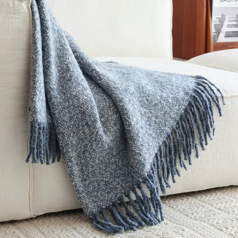 Polyester sofa blanket 120x170cm in khaki folded on a modern sofa