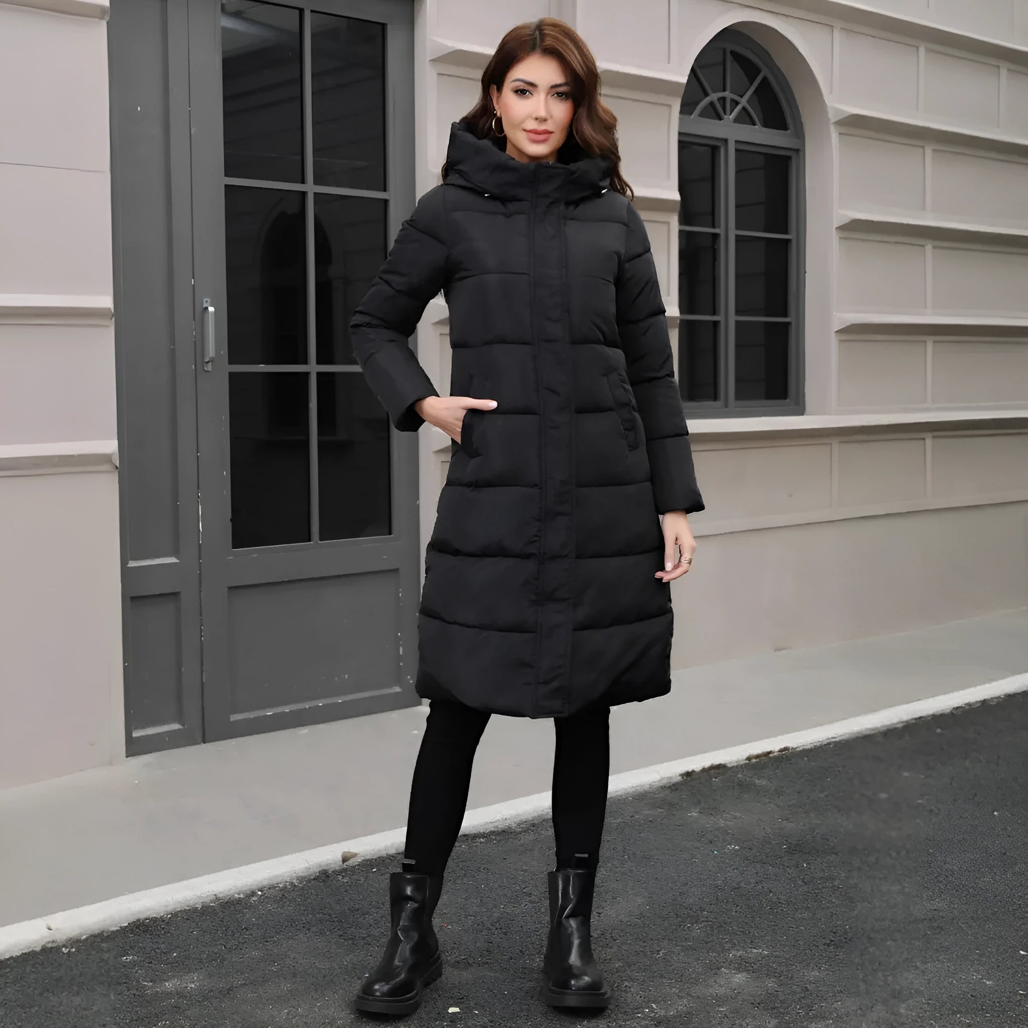 Black slim fit hooded jacket with long sleeves for cold weather protection