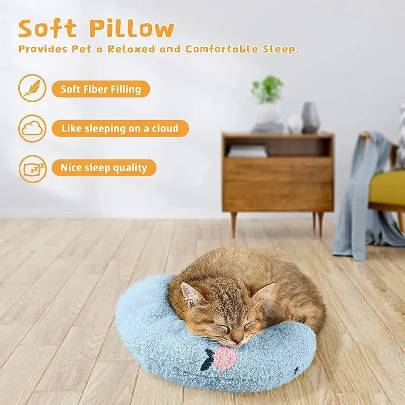 Small U-shaped plush pet pillow in blue for a cat or small dog to sleep on.