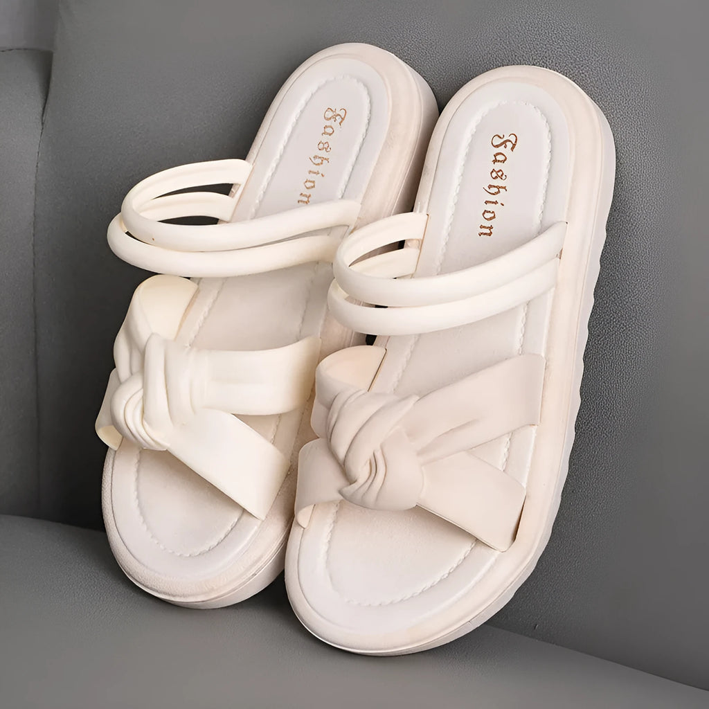 Women's black PVC outdoor sandals showing soft back thick back construction and two-way wear design