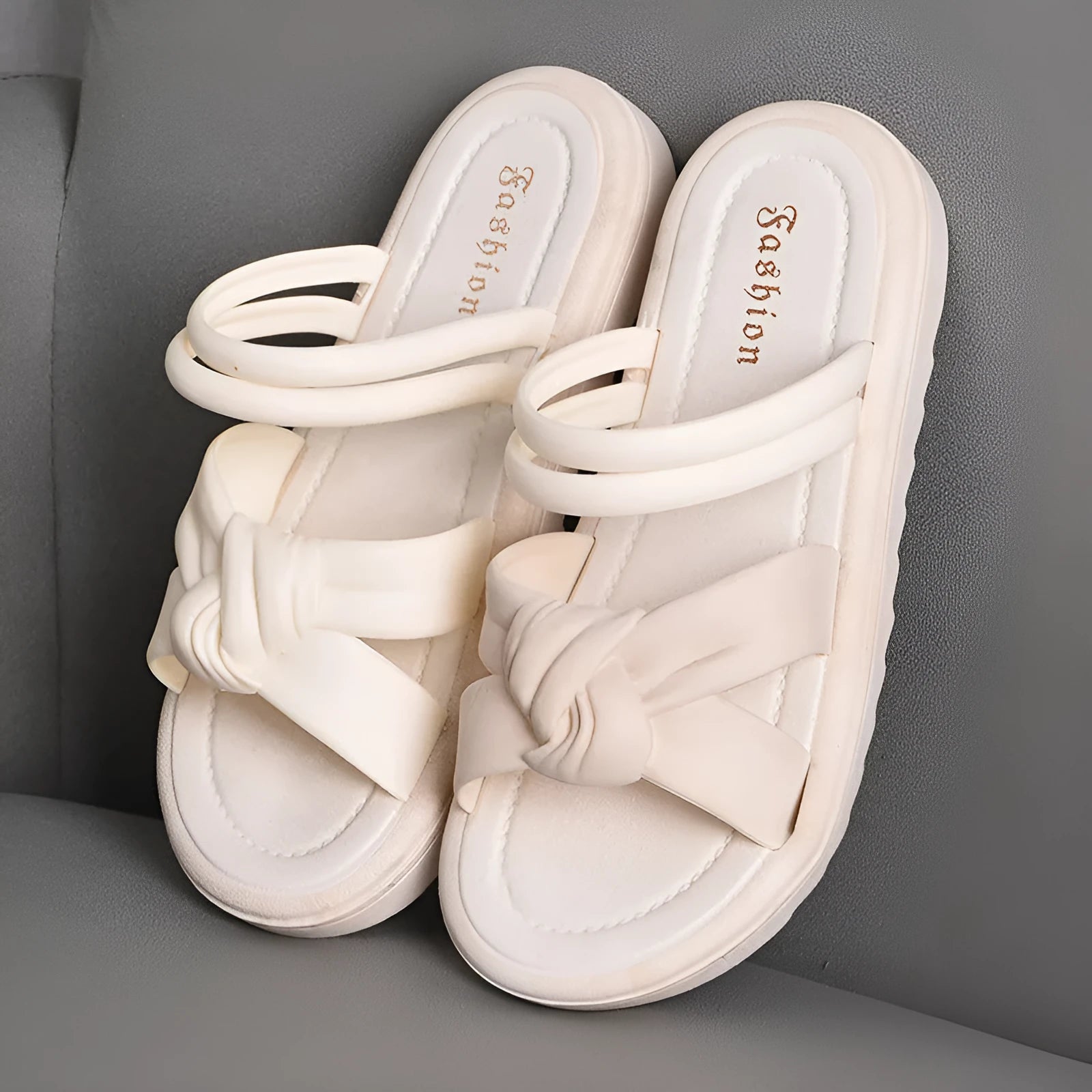 Women's black PVC outdoor sandals showing soft back thick back construction and two-way wear design