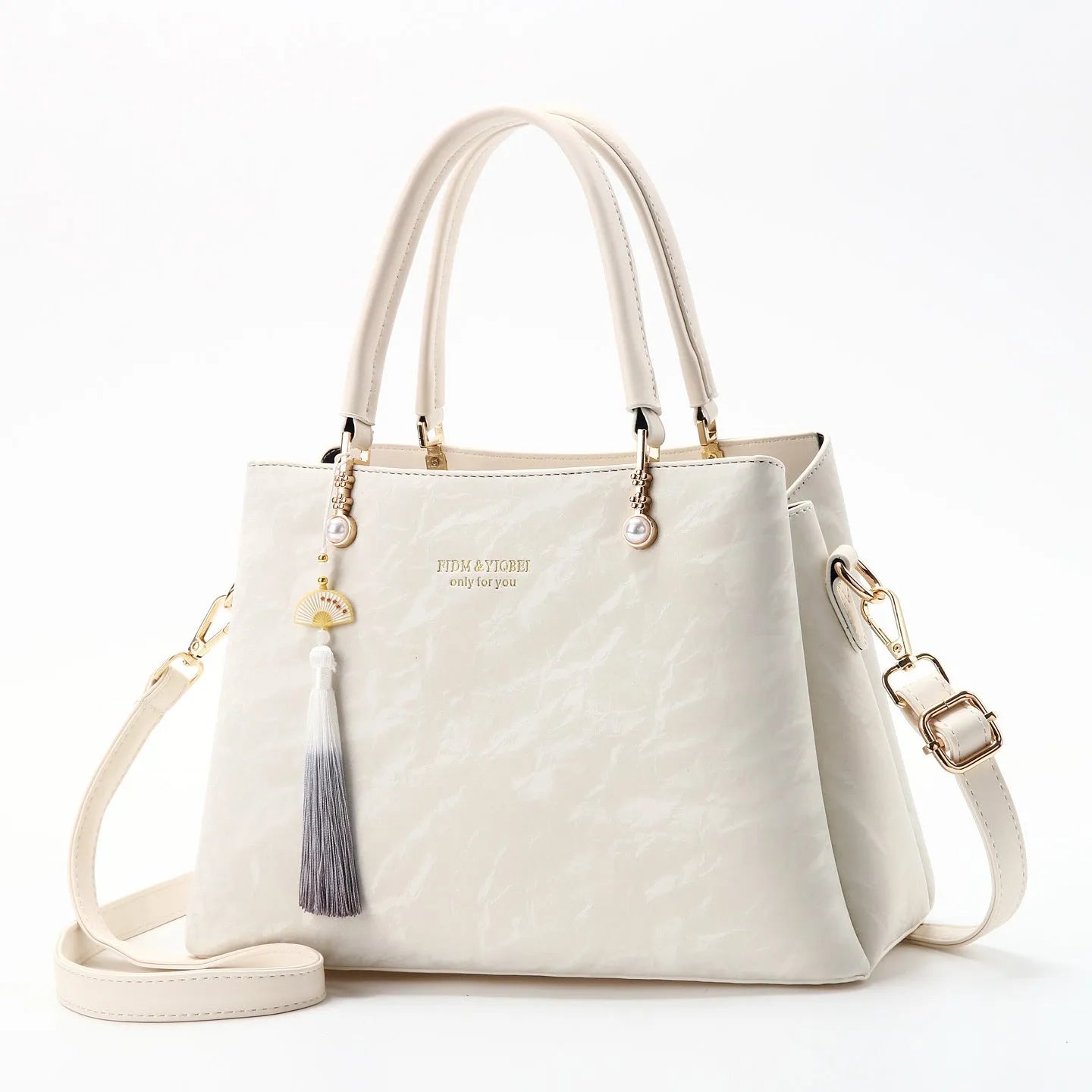 Women's square shoulder bag in PU leather with ethnic detailing and slit pocket